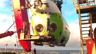 China's deep-sea manned submersible retrieves sample collectors from Mariana Trench