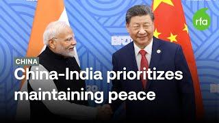 China's Xi meets India's Modi after signing border dispute agreement