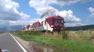 Chasing an Old Train Through the Countryside of Romania, Eastern Europe