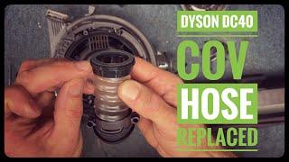 Vacuum repair man shows how to replace a Dyson DC40/UP19 COV hose