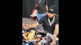 An emotional Allen Iverson giving a pep talk to a kid after signing a photo of him and Kobe (2022)