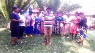 CHOIR SINGING A BEAUTIFUL SONG TO HOUNOR CANON BLASTO SAMWEL OOKO