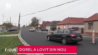 Stâlp de electricitate în mijlocul șoselei