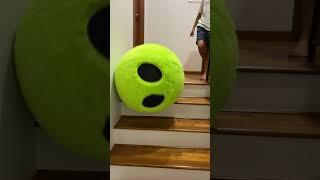 The Giant Bouncing Alien Rolling down Stairs