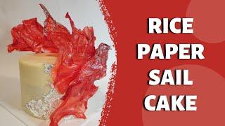 Red rice paper sail cake