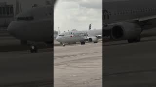 This airplane is moving into position to dock at its gate.