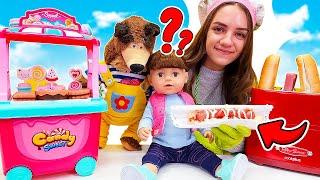 Kids pretend to play cooking toy food for the baby doll. What toy food will the baby doll choose?