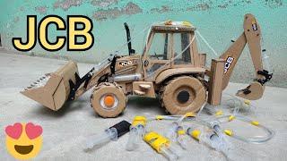 how to make cardboard jcb/cardboard se jcb kaise banate hain/how to make hydraulic jcb with syrunge