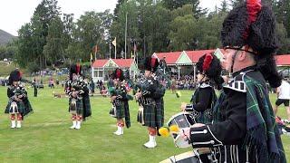 Lonach Pipe Band playing 'My Land' bagpipe set during the 2021 Grampian Highland Games in Braemar