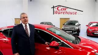 The Car Warehouse - Where the cars are bright and the deals are right