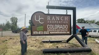 New sign at UC Colorado Ranch Brokers and Auctioneers in Hotchkiss Colorado.  Gary Hubbell ALC