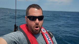 Kayaking in rough weather across Grand Traverse West Bay to Power Island