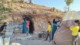 Committed hands:single mother and her three children camping in hidden cave landscape