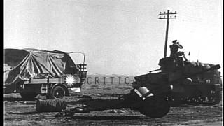 British Eighth Army tanks advance along a desert highway in North Africa during W...HD Stock Footage