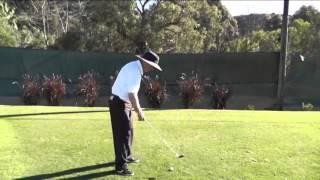 Right elbow on the downswing