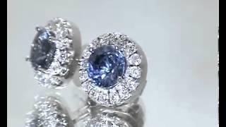 Blue sapphire ear studs with diamond border