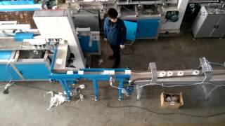 Automatic toilet paper cutting and packing machine