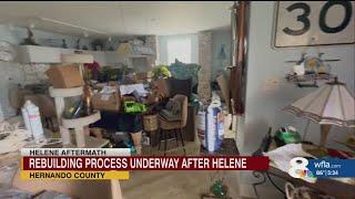 Hernando Beach residents salvage what they can from their homes following record-breaking storm surg