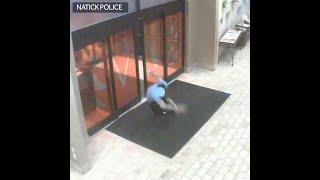 Video shows man with gun chasing person who frantically runs into Natick hotel