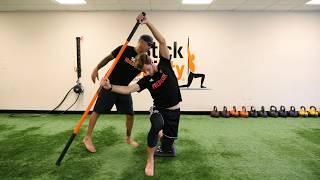 Tight Low Back and Tight Hips? Try this Bow and Arrow Stretch! - Stick Mobility Exercises