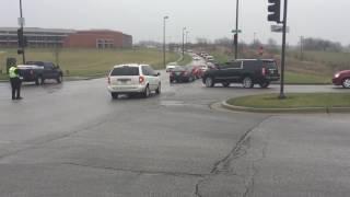 Parents gather at Staley High School to pick up evacuated students