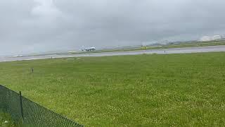 Boeing 747-8F takeoff on wet runway