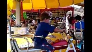 Bobby rides a motorcycle at the L.A. County Fair 2014