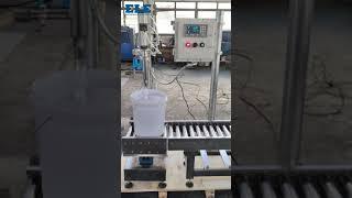 Filling machine for filling paint, coating ink and related fluid product