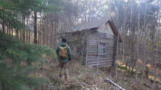 Restoration of an abandoned wooden house in the forest. Spending the night alone.