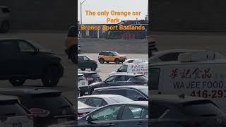 The only Orange car In the Parking / Bronco sport Badlands