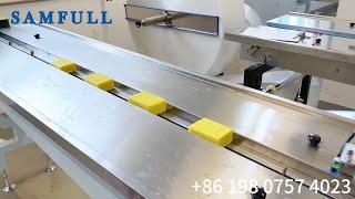 Horizontal soap bar flow wrap machine